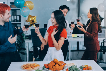 Diversity, dinner and group of people toast celebration together at party. Friends, happy and celebrate with food, wine and friendship for love, support and cheers champagne at business function