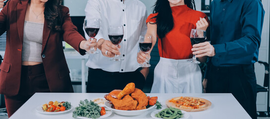 Diversity, dinner and group of people toast celebration together at party. Friends, happy and celebrate with food, wine and friendship for love, support and cheers champagne at business function