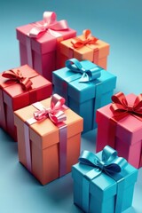 Obraz premium Close-up view of assorted colorful gift boxes with ribbons and bows on a blue surface , paper boxes, vibrant colors