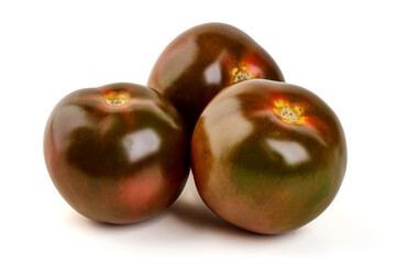 Three Black Tomatoes, isolated on white background