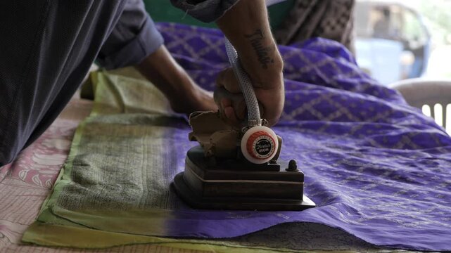 Unraveling the Art of Ironing - A Journey into the World of Traditional Textile Care
