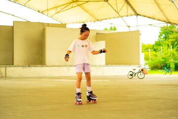 Asian teen girl roller skating. Roller-skating. Korea