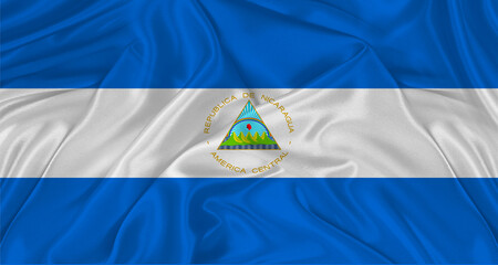 Flag of Nicaragua with cloth texture. Close up of Nicaraguan flag waving