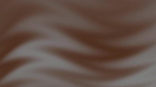 Abstract brown blurred image with flowing wavy forms, suitable for backgrounds, design projects, website headers, and artistic compositions. Ideal for creative visual projects.