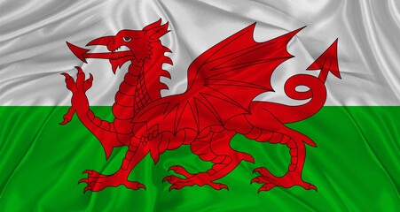 Flag of Wales with cloth texture. Close up of Wales flag waving