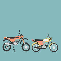 Two different style motorcycles a classic moped and an off road bike.