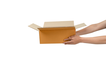 This is a photograph of an open, empty light-brown cardboard box being held by two hands  against a clean, isolated white background. The image clearly communicates delivery, receiving, giving, or unb