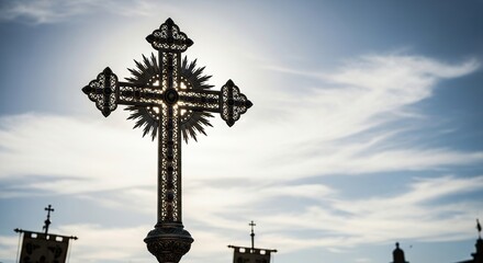 Ornate religious cross against a bright sky faith symbol spiritual monument christianity architecture