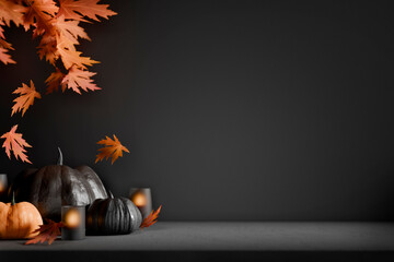 Halloween pumpkins and orange maple leaves on dark empty table for product display scene. November Black friday sale background. Thanksgiving holiday autumn decoration.