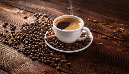 Coffee Cup With Beans On Wooden Background