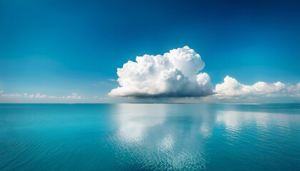 A Large Fluffy Cloud Floats Above Calm Turquoise Water Reflecting The Sky And Clouds