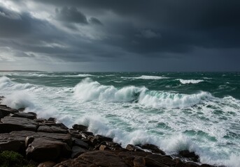 Fototapeta premium A massive, crashing ocean wave with a deep turquoise core and billowing white sea spray. The powerful, foaming water dominates the frame, conveying the raw, immense force of nature and the beauty and 