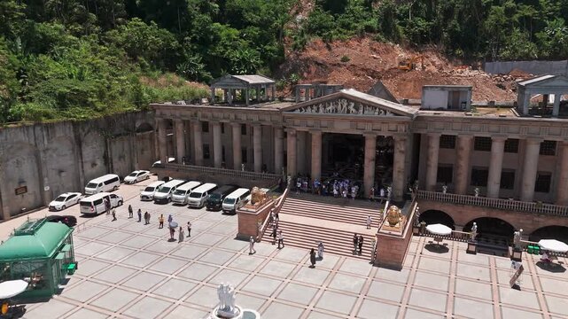 Drone footage of the Temple of Leah in Cebu, Philippines. Showcasing Roman-inspired architecture, cultural heritage, and a popular tourist attraction with grand columns and statues.
