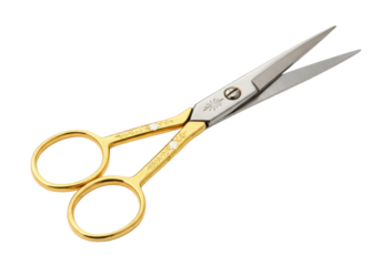 Isolated gold handled stainless steel scissors, small pointed precision embroidery scissors