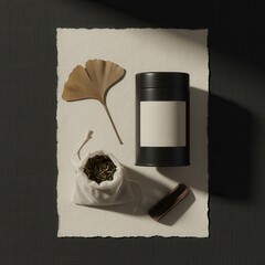 Black tea tin mockup with loose leaf tea and ginkgo, flat lay