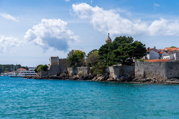 Naklejka premium KRK Island, Croatia - April 19, 2025: Cityscape. View of Frankopan Castle.