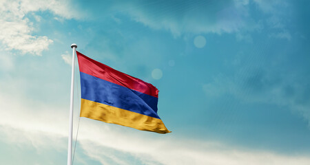 Armenia national flag fluttering. The flag blowing in beautiful soft sky. Armenia national flag for independence day.