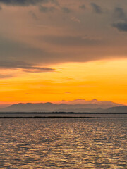 Vibrant Sunset Over the Water in Indonesia