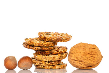 Thaler cookies with nuts and honey isolated on white background, close-up.