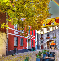 Autumn motif in medieval street in district of  old European town. Only traditional digital tools were used 