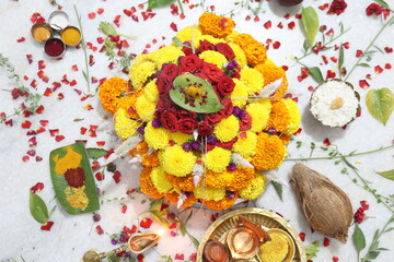 colorful flowers stacked up to create bathukamma, a specific hindu god worshiped in south india