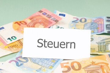 Tax, german lanuage, taxation law, deadline for payment, financial income, business taxes, euro banknotes, paying money to state

