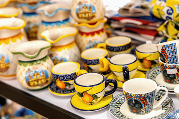 Sicilian souvenir cups and decorative ceramic jugs
