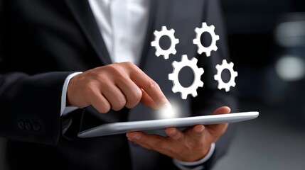 Businessman in a suit using a digital tablet with gears displayed on the screen, representing the automation and optimization of business processes and technological integ n.