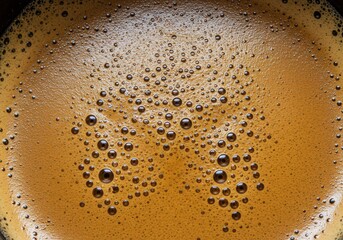Close-up of espresso crema with bubbles