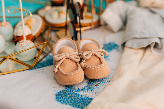 Baby Boy Christening Shoes and Outfit Display
