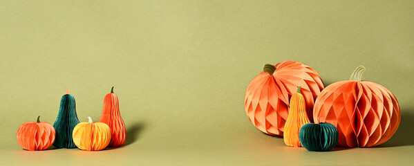 Autumnal composition of paper pumpkins