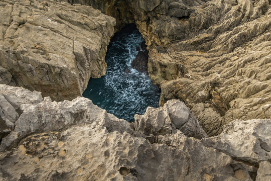 Blowhole and sharp limestones in the eastern coast of Asturias, northern Spain