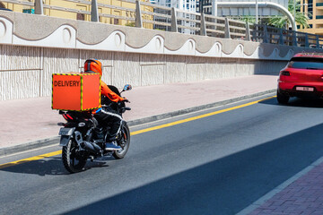 Fast and free delivery food by scooter in the city.