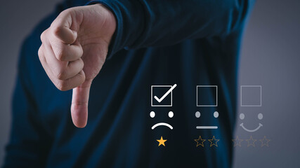 Customer showing thumbs down with poor rating feedback icon, concept of negative review, dissatisfaction, low quality service, bad customer experience, business failure, online reputation management.