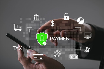 Hands using smartphone with digital payment and security icons, representing secure online transaction, mobile banking, fintech protection, encrypted data, tax payment, financial technology system.