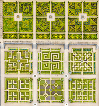 Aerial view of the meticulously manicured geometric patterns of the Renaissance gardens, a tapestry of verdant hues and symmetrical designs, Villandry, Centre-Val de Loire, France.