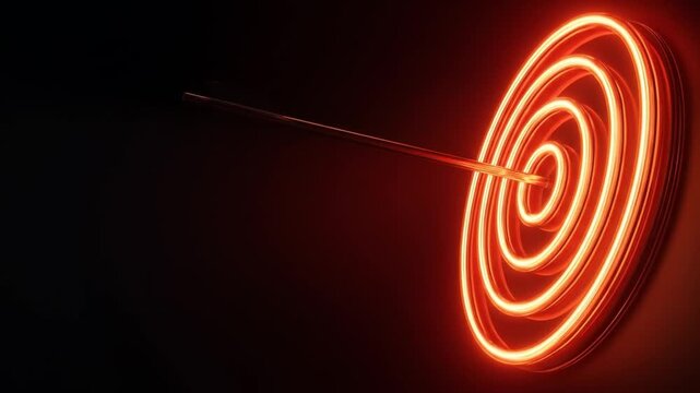 Glowing target with an arrow hitting the center on black background