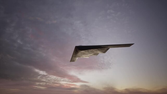 Stealth Bomber Flying At Sunset