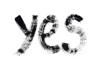 The word "yes" is depicted, written with a wide brush in black paint on a white background. The letters are expressive, the brushstrokes leaving a textured effect with gaps and brush marks.