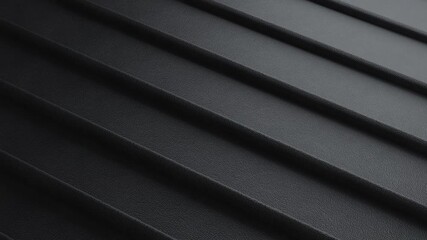 Close-up of a dark grey textured surface with parallel diagonal ridges, creating a repetitive pattern and industrial feel. The granular, pebbled texture adds depth and visual interest - Powered by Adobe