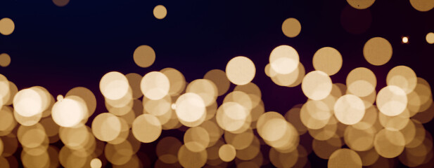 Golden bokeh lights creating a festive and warm holiday ambiance. 3d rendering