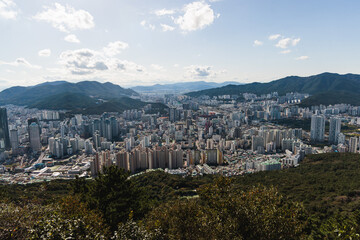 Busan city panorama beautiful skyline view from Hwangnyeongsan mountain observatory, Busan port, Gwangan bridge and harbor bay, South Korea, Yeongnam district, sunny day, travel to Republic of Korea