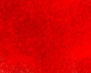 A rich red textured background. The rough, grainy surface resembles paper or suede. Ideal for creating a dramatic, passionate mood.