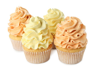 Delicious cupcakes with colorful cream isolated on white