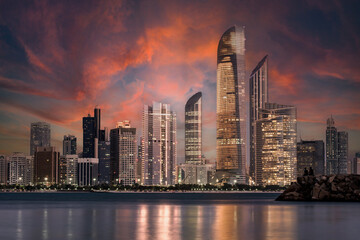 Fototapeta premium Abu Dhabi Seascape with skyscrapers in the background at evening