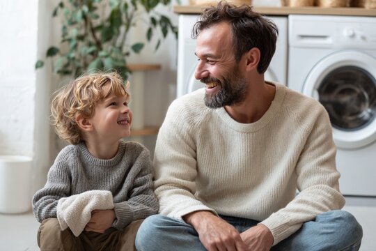 Caucasian father and son sharing a happy moment in a cozy home setting