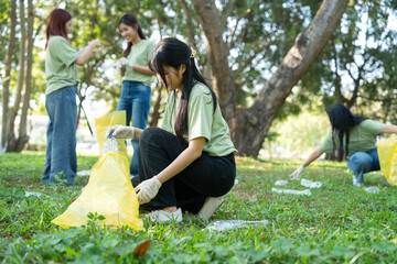 Volunteers show social responsibility by working together to recycle plastic, creating friendly community. Their teamwork help support sustainable environment for future generations. Volunteer concept