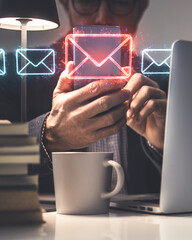 Cybersecurity concept: A businessman using a virtual interface to filter malicious spam and phishing emails