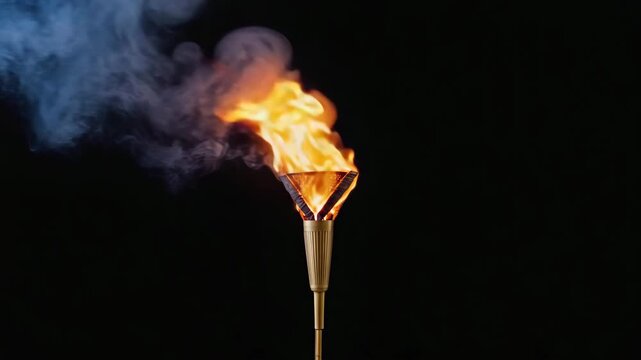 Golden torch burning bright with vivid flames and swirling smoke against a dark backdrop