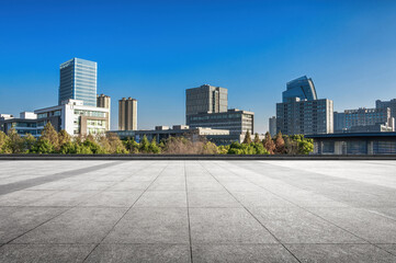 Modern Urban Landscape with Clear Blue Sky and Greenery